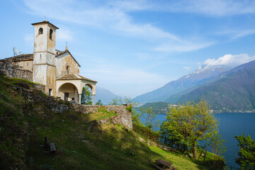 Fototapeta na wymiar The landscape of Lake Como during spring, near the town of Musso, Italy - May 2022.