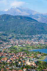Fototapeta na wymiar The landscape of Lake Como during spring, near the town of Musso, Italy - May 2022.