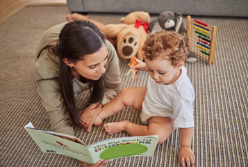 Mother, baby and book for story for education on carpet in home, for learning and reading skills....
