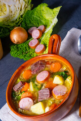 Delicious savoy cabbage stew in a rustic bowl