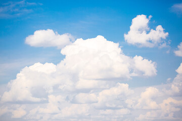 Beautiful clouds against the blue sky. Fluffy clouds, cloudy weather.