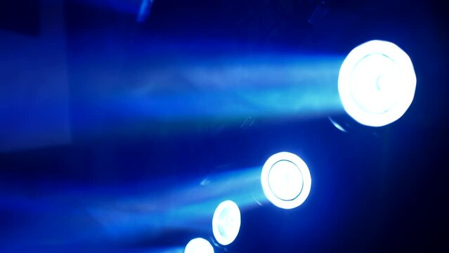 Bright stage lighting, light show at banquet, concert