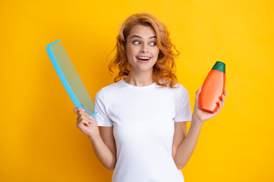 Redhead Woman Hold Bottle Shampoo And Conditioner.