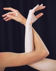 Women, hands and ballet dance arms on black studio background in art for theatre, training or...