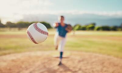 Baseball, sport and ball with a sports athlete or pitcher throwing and pitching a ball during a game or match on a court. Fitness, workout and exercise with an athletic person training outside