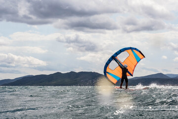Wing foiling in the sea