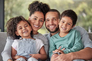 Smile, portrait and happy family love to relax together in a positive home on a fun weekend for...