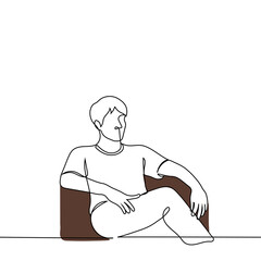 man sits in an armchair informally with his legs crossed - one line drawing vector