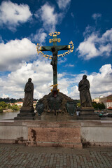 Statuary of the Holy Crucifix and Calvary on Charles bridge. Prague. Czech Republic.