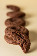 Tasty Chocolate Chip Cookies on Yellow Background Vertical