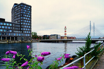 Malmo view to the side University Bridge Universitetsbron and the old lighthouse from 1878 
