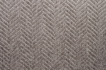 Fabric background. Sticky textured gray fabric with pattern close up. Fabric for the manufacture of fabric blinds or mat, wallpaper