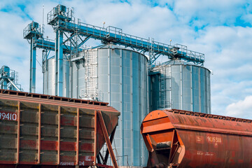 Close-up of railway carriages with grain at grain elevator