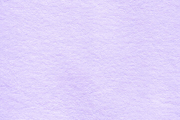 Fototapeta premium Violet towel texture for background. Fabric or textile consist of cotton fiber material. 