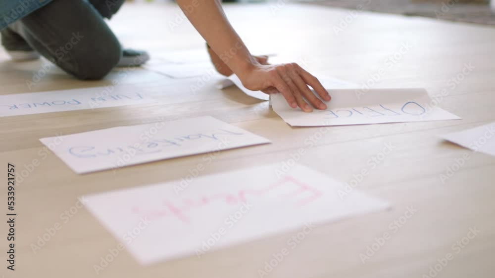 Aufkleber Hoverboard, planning and teamwork with a team working on the floor with documents while thinking of a strategy for future growth. Collaboration, workshop and creative with a design group in a startup