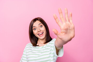 Closeup photo of young positive girl showing high five fingers positive excited funny isolated on...