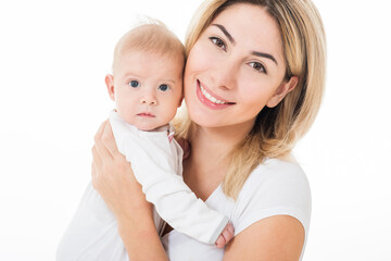 Mother and baby playing and smiling. Happy family.