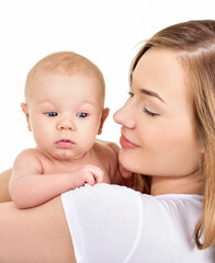 Mother and baby playing and smiling. Happy family.