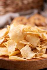 Bread chips, a typical appetizer for aperitivo, dinner in southern Italy and Sardinia. Thin baked slices of wheat flour. Copy space