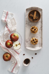 Red and Green apples set against a white background