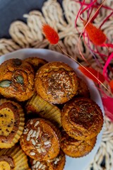 Closeup of pumpkin seed muffins on plate