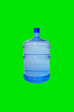 plastic bottle of water with green background