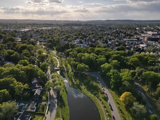 Aerial shot of the Clifton Park in New York City with the sun shining in the background