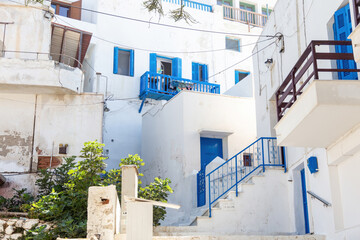 Fototapeta na wymiar Cyclades Naxos island, Greece. Traditional architecture in white and blue