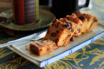 Close up of a pineapple pudding cake at a cozy cafe, autumn season theme