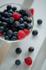 blueberries and raspberries in bowl