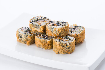 Sushi set and composition at white background. Japanese food restaurant, sushi maki gunkan roll plate or platter set.