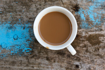Obraz na płótnie Canvas Coffee cup on wooden background