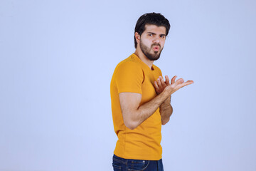 Man with beard looks agressive and angry