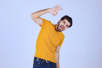 Man with beard showing circle ok sign