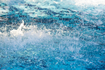 Heavy rain is falling into the swimming pool