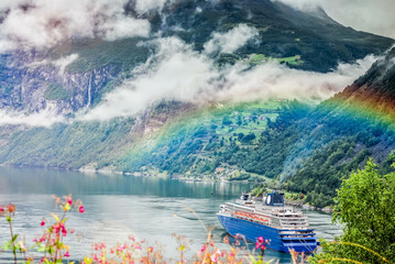 Stunning scenery with cruise ships in Norwegian fjords at Hellesylt and Geiranger - 533951125