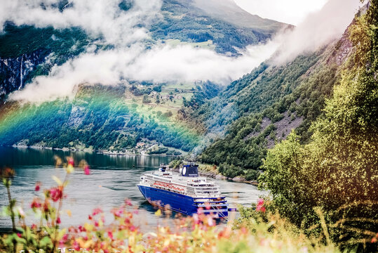 Stunning scenery with cruise ships in Norwegian fjords at Hellesylt and Geiranger
