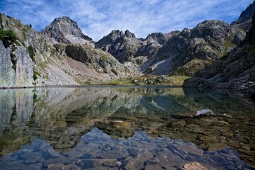 Fototapeta na wymiar Clear water of the Ibones de Arriel in the Spanish Pyrenees