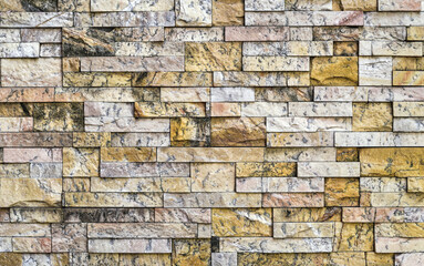 Background made of beige and brown small tiles
