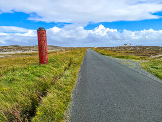 World War Torpedo standing next to road on Tory Island, County Donegal, Ireland © Lukassek