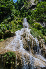Fototapeta na wymiar Landscape view of Erawan waterfall kanchanaburi thailand.Erawan National Park is home to one of the most popular falls in the thailand.The seven level of Erawan waterfall is called 