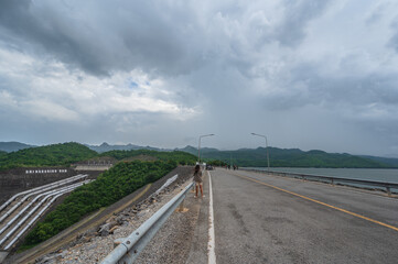 .Beautiful landscape view and people on Srinagarind Dam kanchanaburi city.The Srinagarind Dam is an embankment dam on the Khwae Yai River in Si Sawat District of Kanchanaburi Province