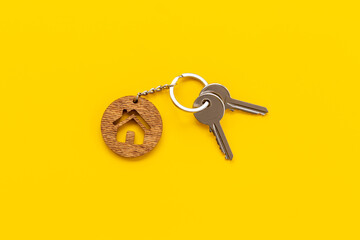 Real estate concept with house shaped keychain and keys