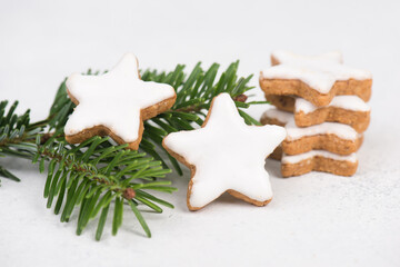 Cinnamon stars, traditional german christmas sweets, gingerbread coated with white sugar, winter...