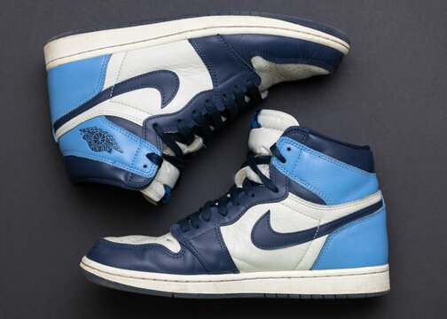 Nike Air Jordan 1 "Obsidian". Pair of Nike Air Jordan 1 Shoes in Blue.
