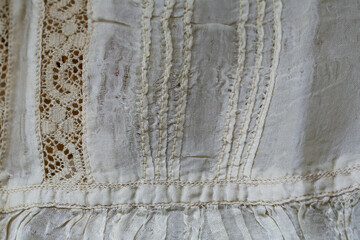 Antique lace family heirloom christening gown - 1930. Close up of the seams and delicate material.