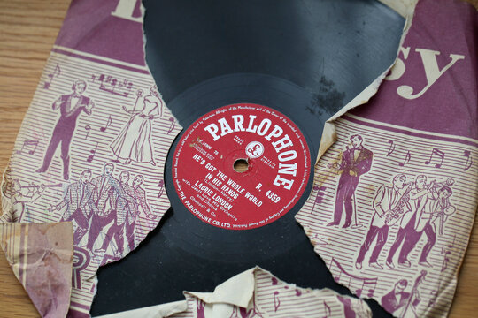 London, UK: September 28, 2022: Parlophone Vinyl Recording of 'He's Got the Whole World in His Hands' by Laurie London. The British branch of Parlophone was founded in 1923.