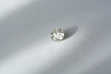 Antique vintage white old natural diamond loose gemstone setting with polished culet. Transparent precious natural cushion faceted European cut gem. Hardness 10. White background. Daylight shadows