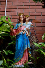 Plakat Closeup of Our lady of perpetual help statue virgin Mary with Child Jesus in the church, Thailand. selective focus.