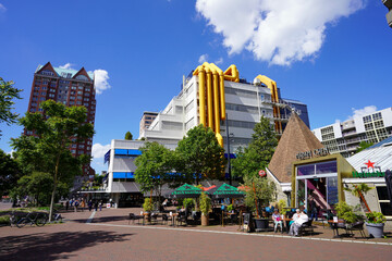 Rotterdam cityscape with Centrale Library Rotterdam against blue sky, Netherlands